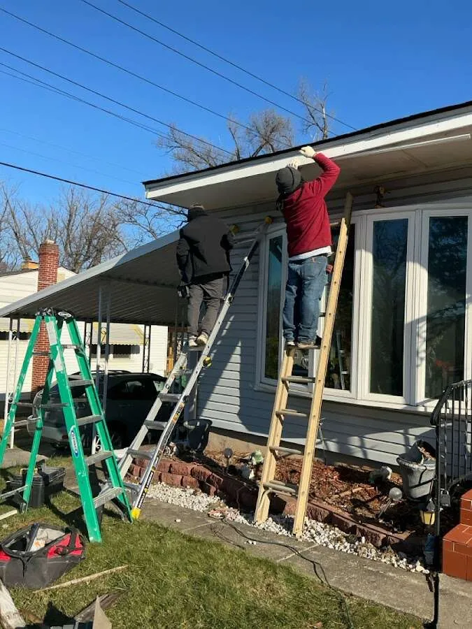 Restoration crew performing exterior repair in McCordsville