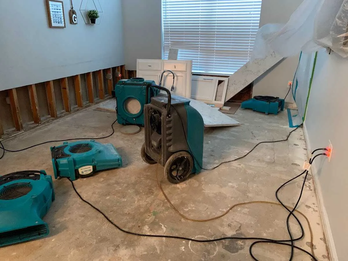 Dehumidifier in flood-cut room for Water Damage Restoration in McCordsville